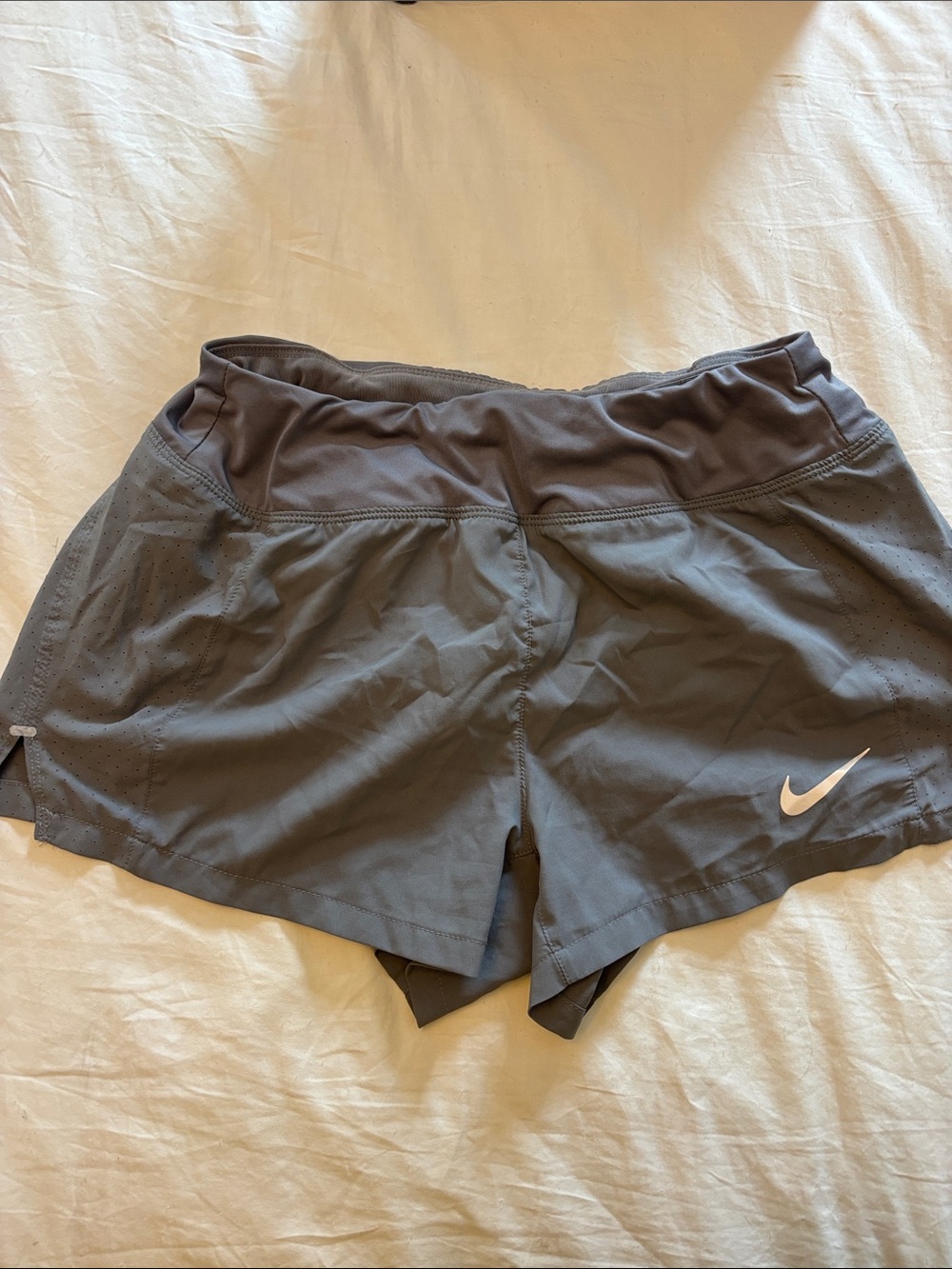 Nike Women's Charcoal Gray Athletic Running Shorts with White Swoosh